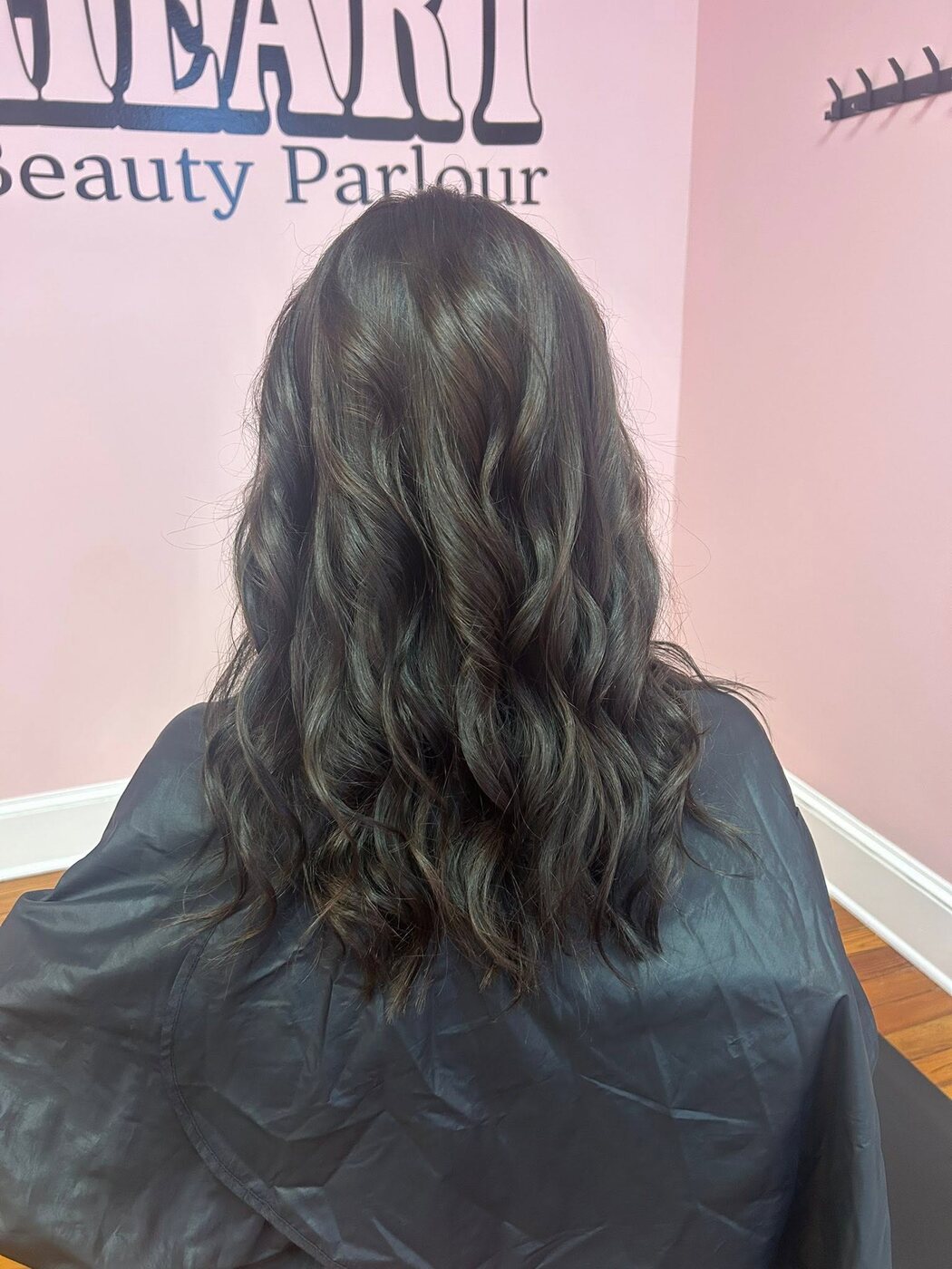 Deep brunette waves with subtle dimension