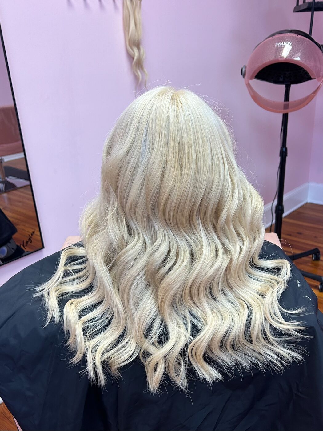 After extensions: long, full platinum blonde waves by Kylie