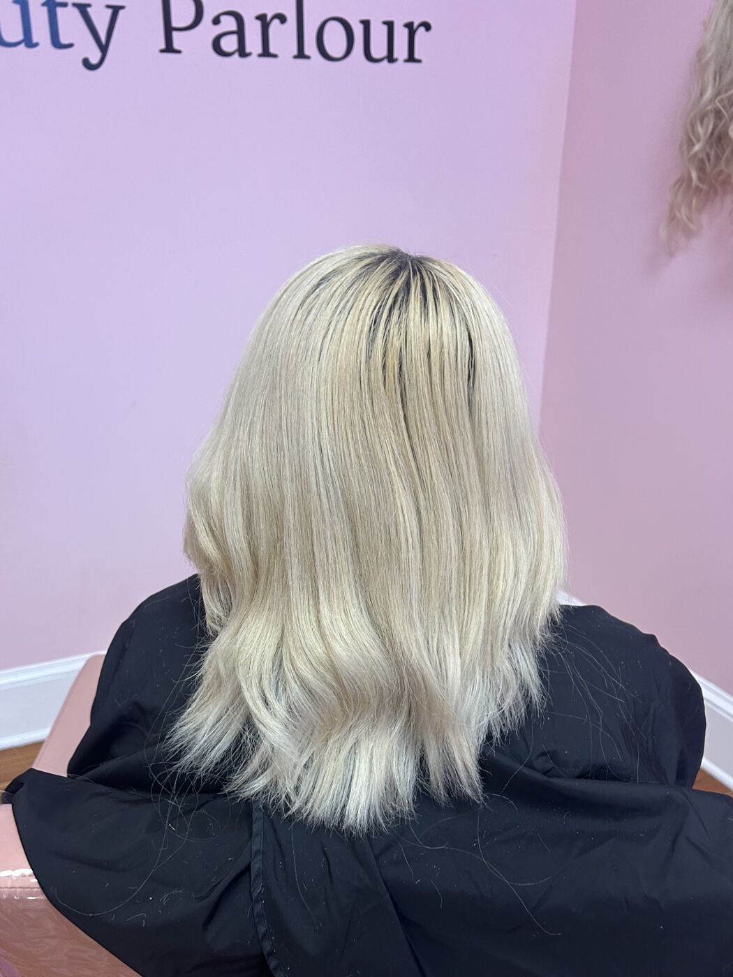 Before extensions: shoulder-length blonde hair